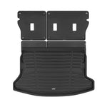 A set of black TuxMat trunk mats for Subaru Impreza models.