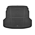 A set of black TuxMat car floor mats for Kia Forte/Forte5 models.