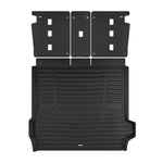 A set of black TuxMat trunk mats for BMW X5 models.
