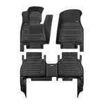 A set of black TuxMat car floor mats for BMW X7 models.