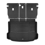 A set of black TuxMat trunk mats for Range Rover Evoque models.