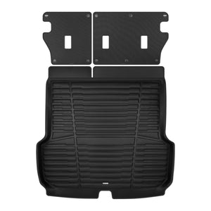 A set of black TuxMat trunk mats for Subaru Outback models.