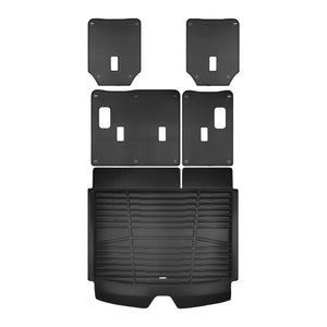 A set of black TuxMat trunk mats for Chevrolet Suburban models.