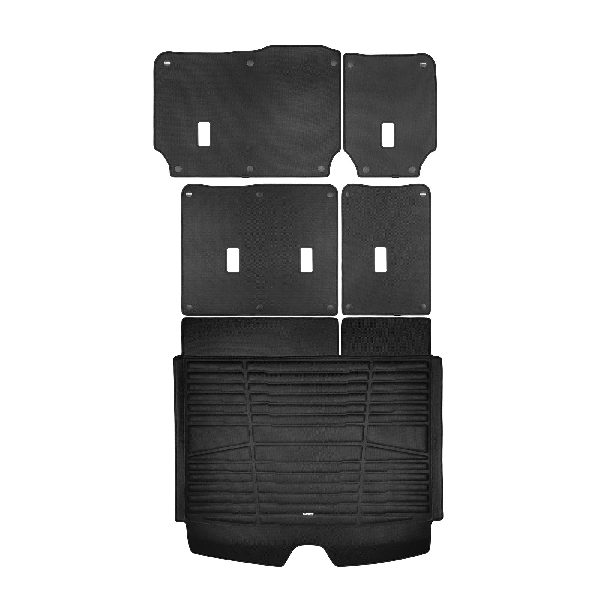A set of black TuxMat trunk mats for Chevrolet Suburban models.
