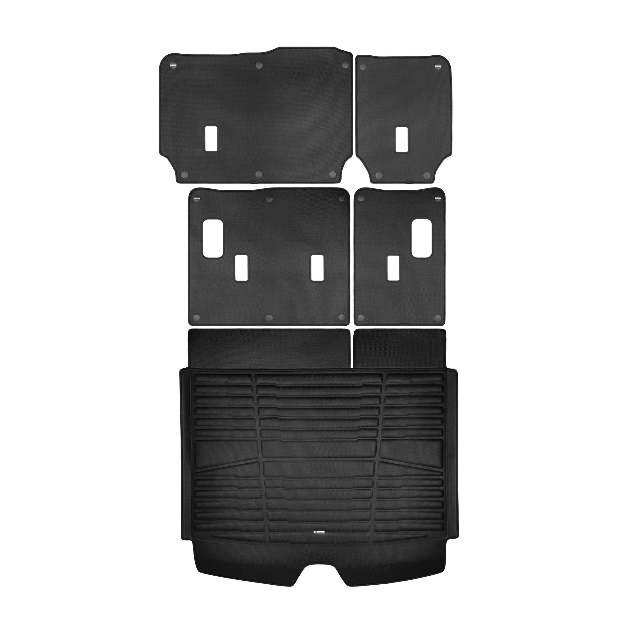 A set of black TuxMat trunk mats for Chevrolet Suburban models.