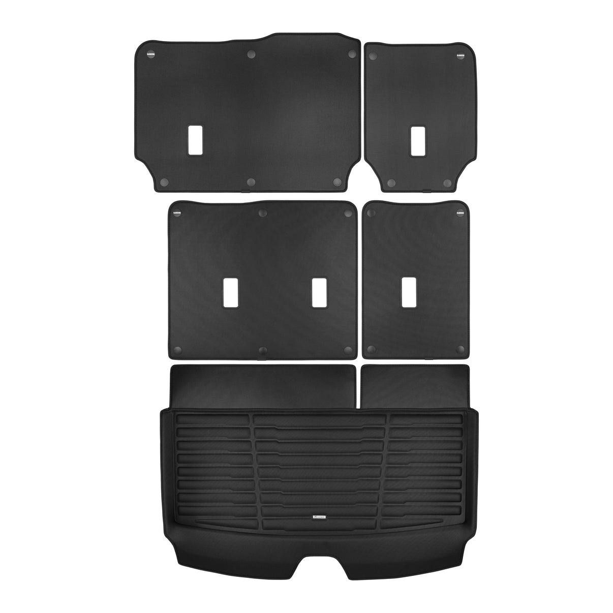 A set of black TuxMat trunk mats for GMC Yukon models.