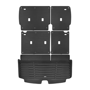 A set of black TuxMat trunk mats for Nissan Pathfinder models.