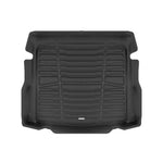 A set of black TuxMat trunk mats for BMW 2-Series models.