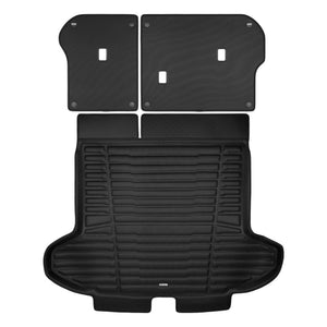 A set of black TuxMat trunk mats for Kia Sportage models.