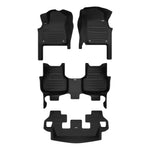 A set of black TuxMat car floor mats for Audi Q7 models.