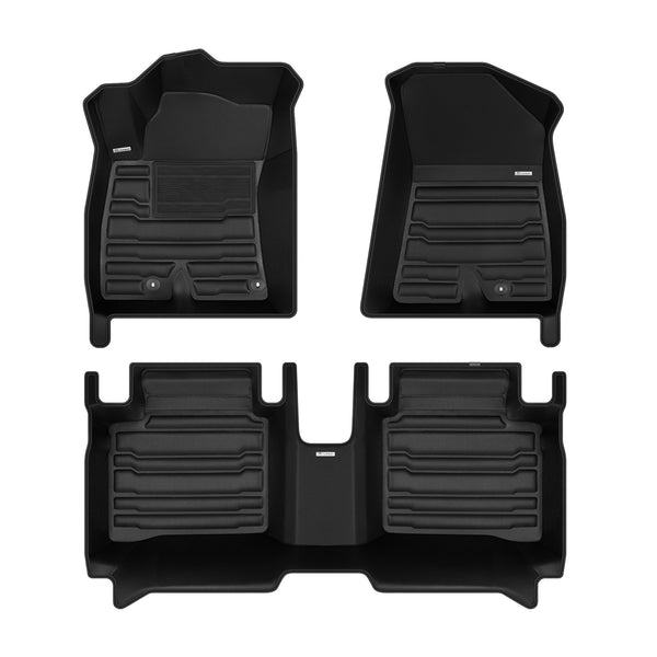 A set of black TuxMat car floor mats for Kia Niro models.