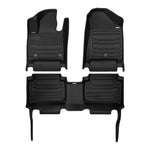 A set of black TuxMat car floor mats for Hyundai Santa Fe models.