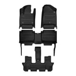 A set of black TuxMat car floor mats for Hyundai Santa Fe models.