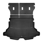 A set of black TuxMat trunk mats for Subaru Forester models.