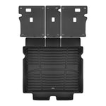 A set of black TuxMat trunk mats for Porsche Macan models.