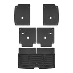 A set of black TuxMat trunk mats for VinFast VF9 models.