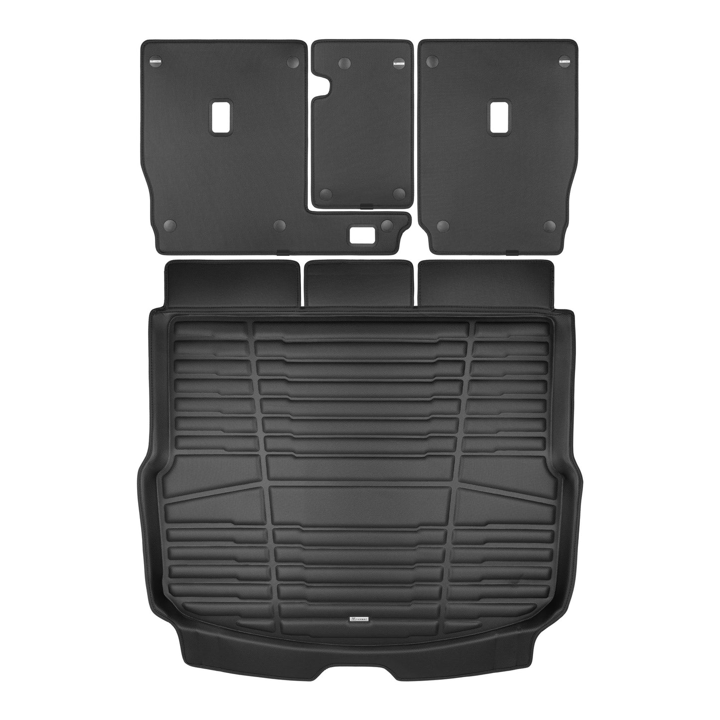 A set of black TuxMat trunk mats for Land Rover Discovery Sport models.