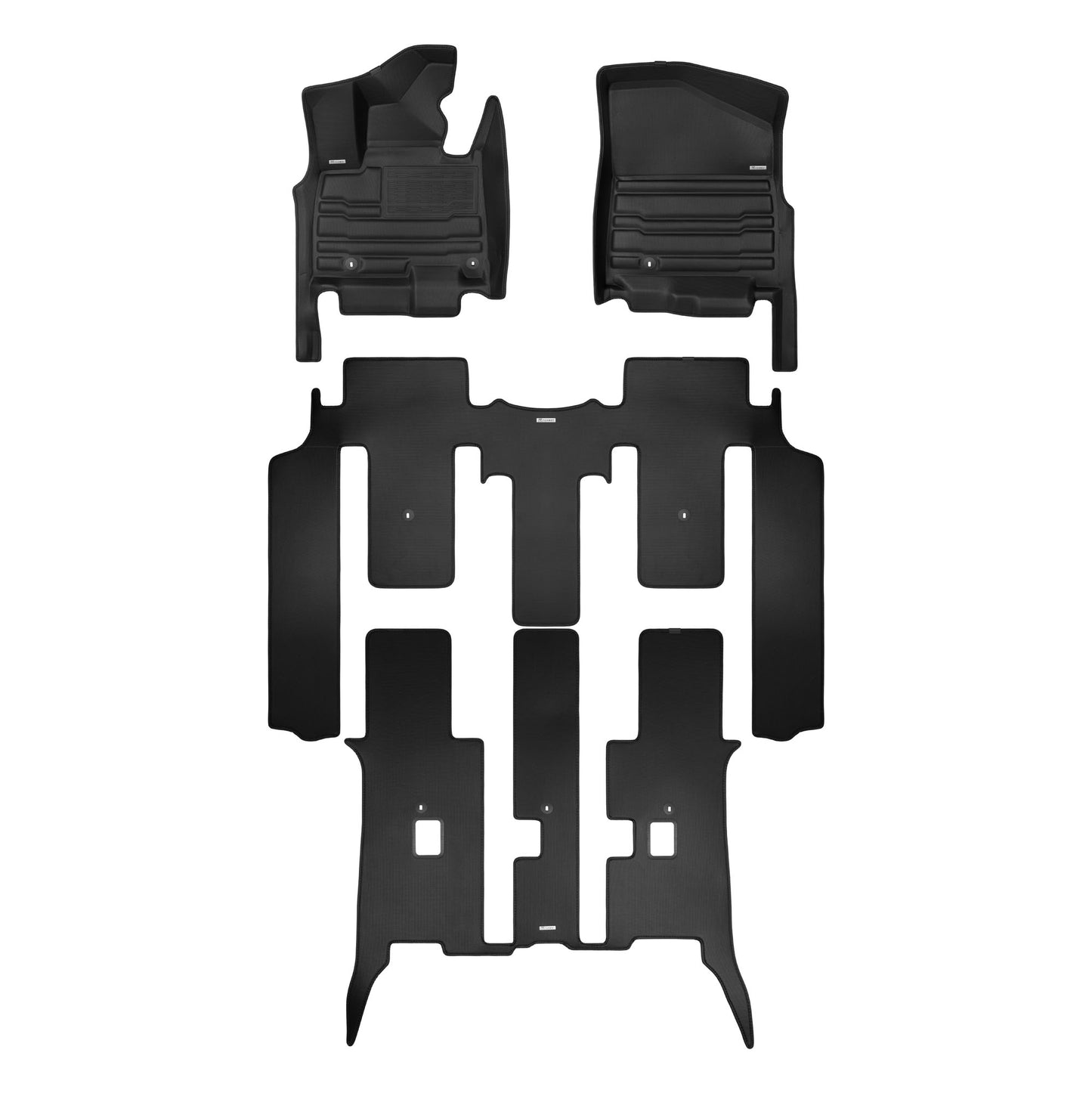 A set of black TuxMat car floor mats for Kia Carnival HEV models.