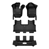 A set of black TuxMat car floor mats for Volvo EX90 models.