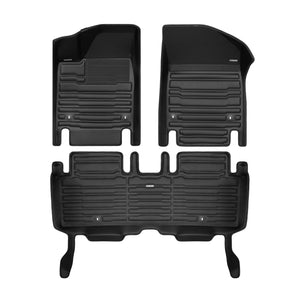 A set of black TuxMat car floor mats for Kia EV6 models.