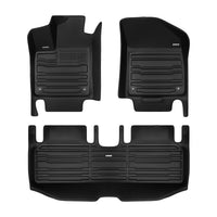 A set of black TuxMat car floor mats for Kia EV4 models.