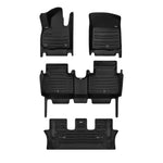 A set of black TuxMat car floor mats for Hyundai Palisade models.