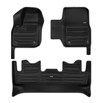 A set of black TuxMat car floor mats for Nissan Leaf models.