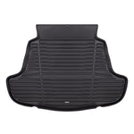 A set of black TuxMat trunk mats for Toyota Camry models.