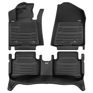 A set of black TuxMat car floor mats for Hyundai Tucson models.