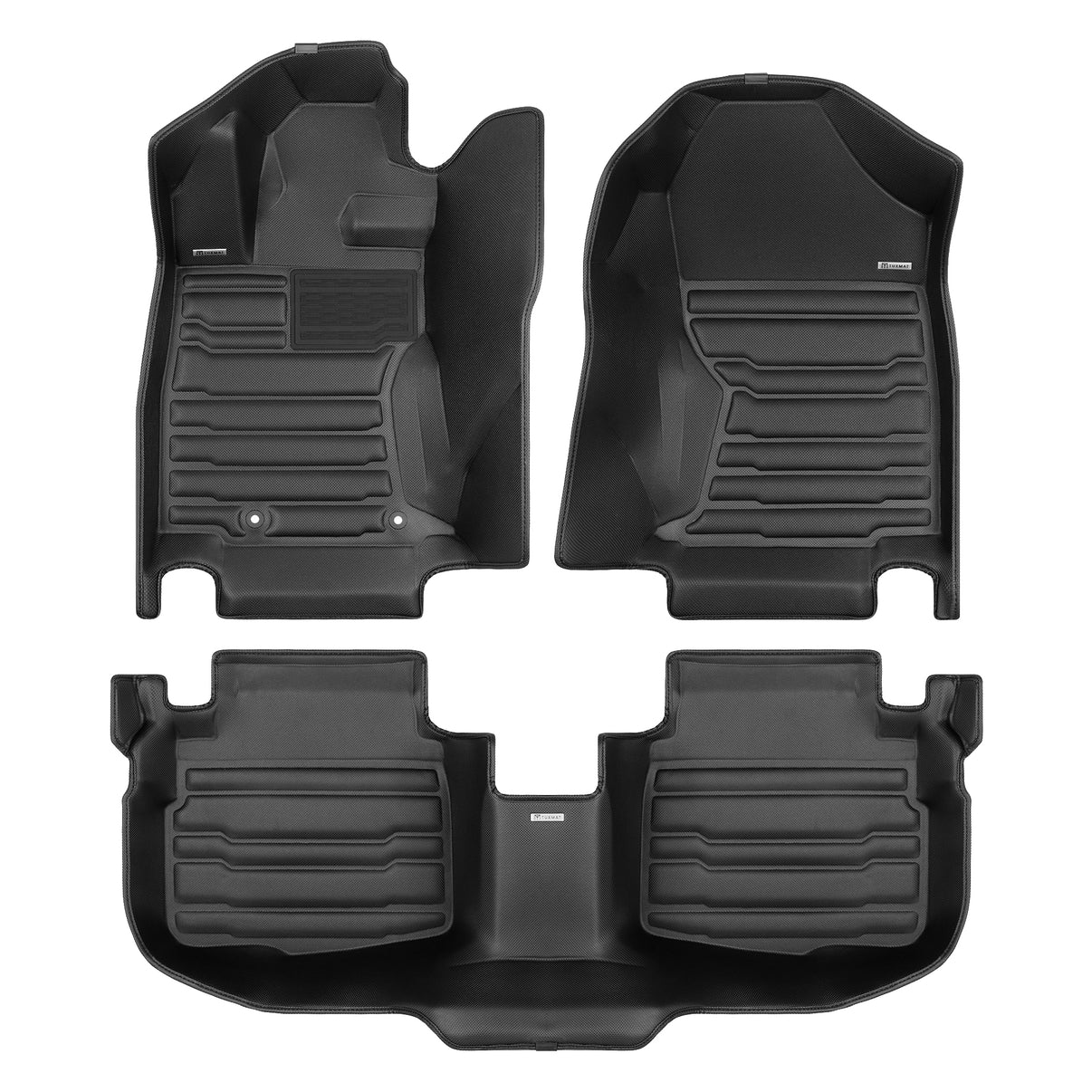 A set of black TuxMat car floor mats for Subaru Legacy models.