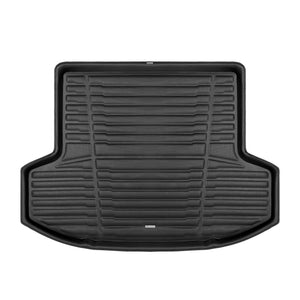 A set of black TuxMat trunk mats for Nissan Versa models.
